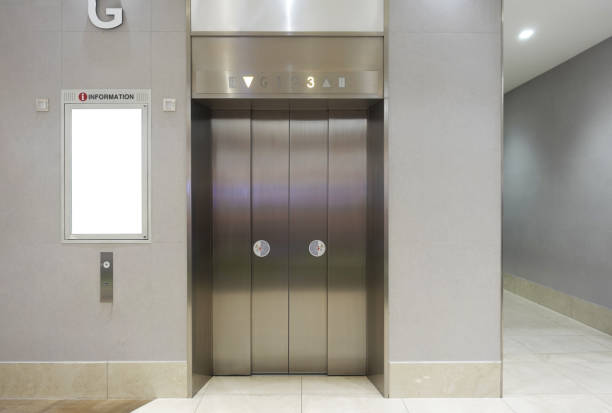 istock Elevator with blank information board in supermarket 2195677569