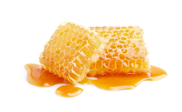 istock Honeycomb with honey on white background 2195677786