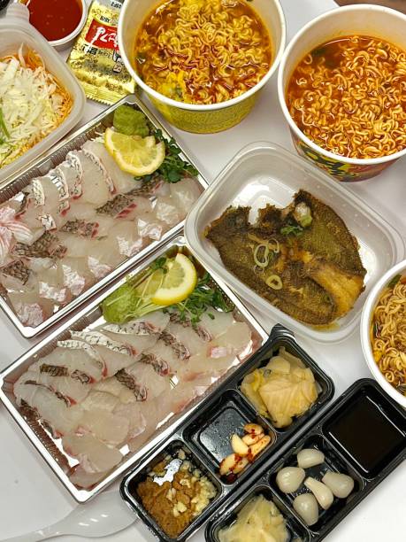 istock Sashimi, a Japanese delicacy featuring thinly sliced raw fish, served fresh and beautifully arranged for a pure and flavorful experience. 2195687360