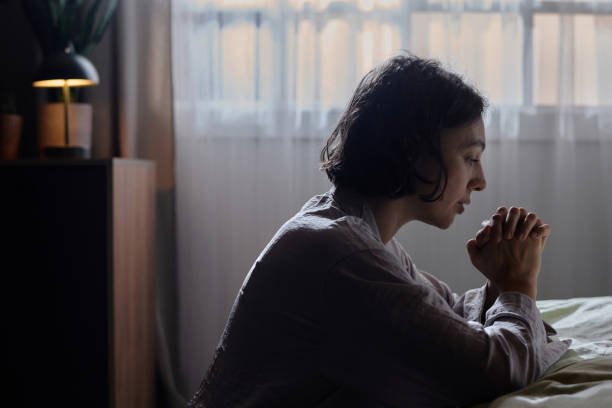 istock Woman Praying after Sleep 2195687503