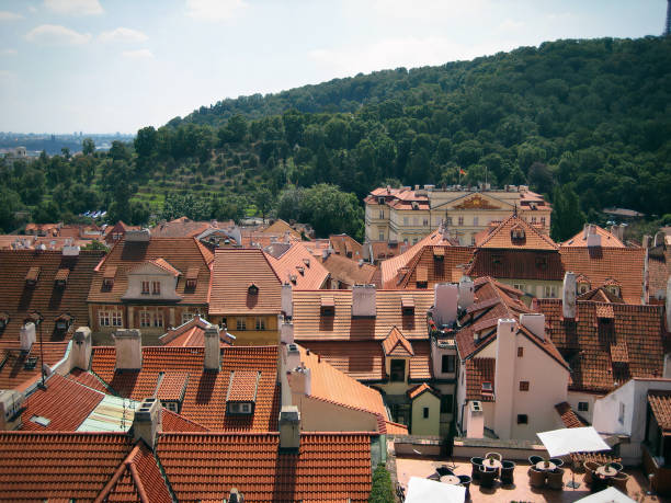 Aerial view of Prague’s red roofs as seen from a hot air balloon.