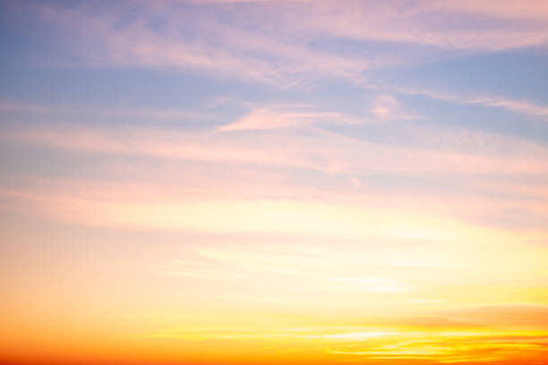 istock Sky,sunset, beautiful , luxury soft gradient orange gold clouds and sunlight on the blue sky perfect for the background, Sunrise on morning or everning in winter warm time ,Twilight summer,silhouette 2195689682