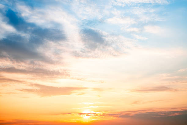 istock Sky,sunset, beautiful , luxury soft gradient orange gold clouds and sunlight on the blue sky perfect for the background, Sunrise on morning or everning in winter warm time ,Twilight summer,silhouette 2195689695