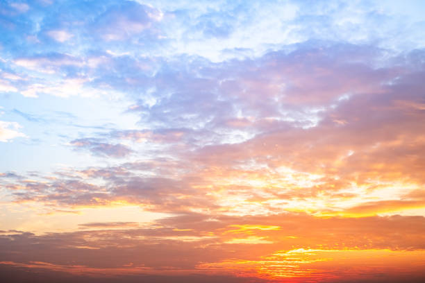 istock Beautiful , luxury soft gradient orange gold clouds and sunlight on the blue sky perfect for the background, take in evening,Twilight, Large size, high definition landscape photo 2195690314