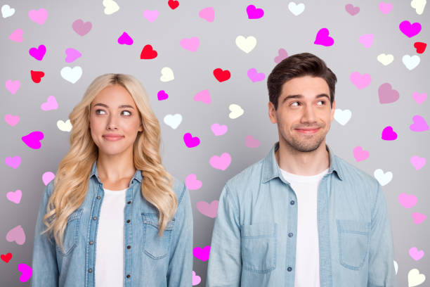 istock Portrait of attractive cheery minded couple creating solution thinking isolated over gray pastel color background 2195691800