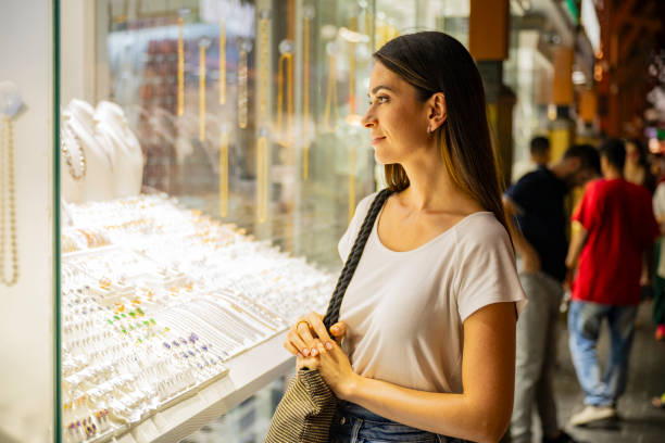 Woman window shopping in Dubai Gold Souk