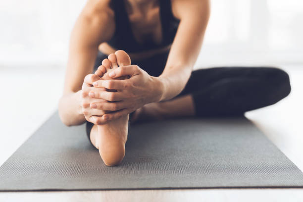 istock Stretching Routine During Yoga Practice in a Bright Indoor Space for Relaxation and Flexibility 2195695336