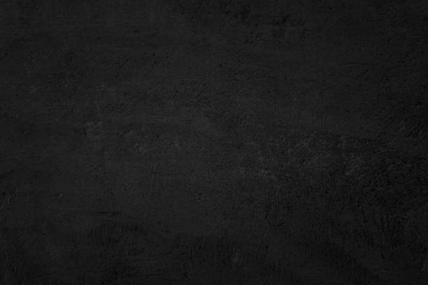istock Black dark concrete wall background. Pattern board cement texture grunge dirty scratched for show anthracite promote product urban floor and abstract paper design element decor. Blackboard blank. 2195698590