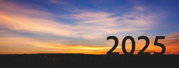istock New year 2025 with sunset sky and mountain background 2195704502