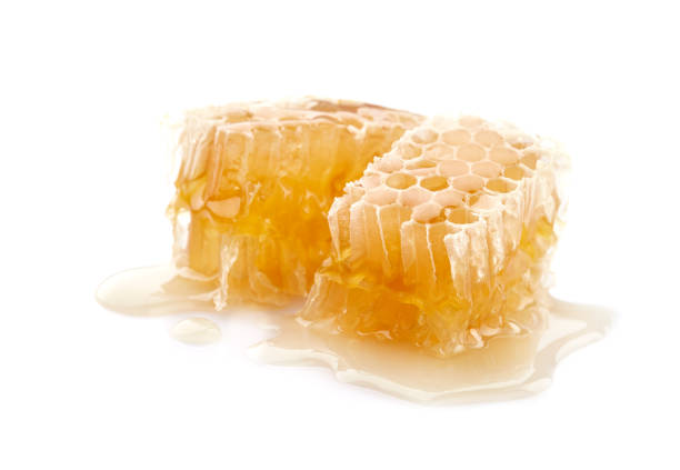 istock Honeycomb in closeup on white background 2195704508