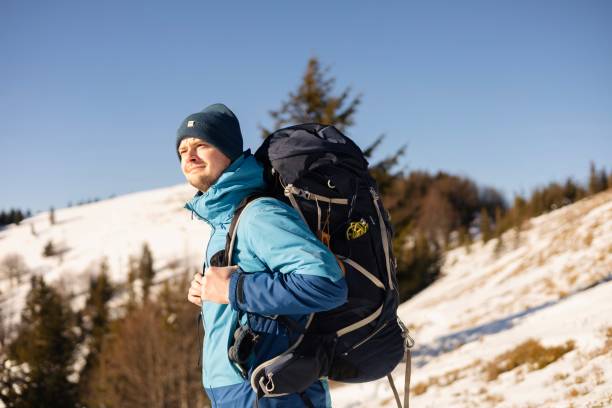 istock Young Hiker Enjoying Scenic Mountain Views 2195704511