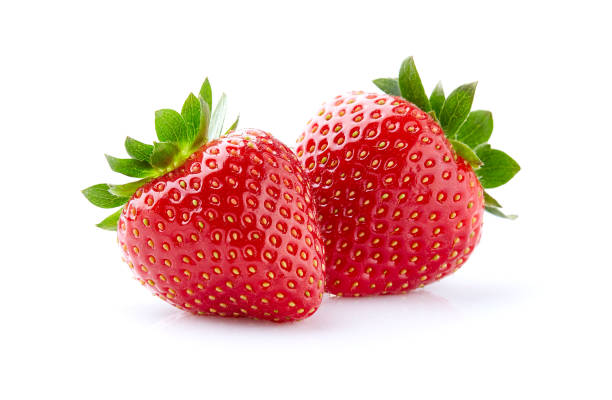 istock Strawberries in closeup on white background 2195705252