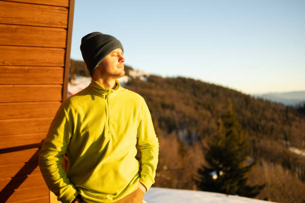 istock Chasing the Sun: Man Enjoying a Stunning Mountain Sunset 2195705469