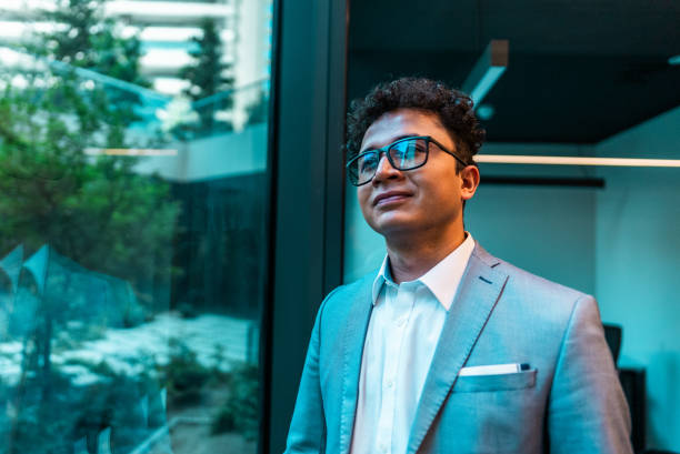 istock Businessman contemplating on the office 2195708008