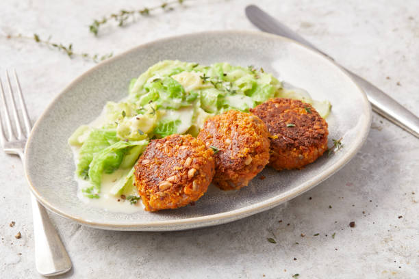 istock Vegan Balls with Cabbage and Mustard Sauce 2195708731
