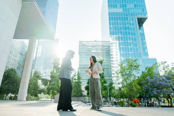 istock Coworkers talking in the city 2195709494