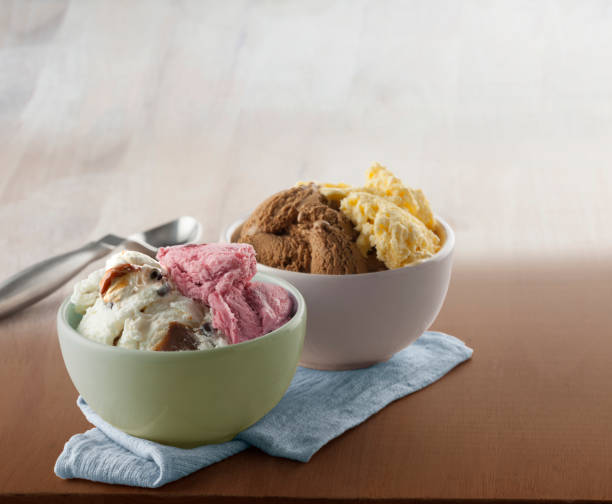 istock Two bowls with ice cream on a napkin 2195709664