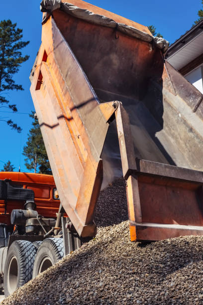 istock Truck pours rubble on the ground. 2195712253