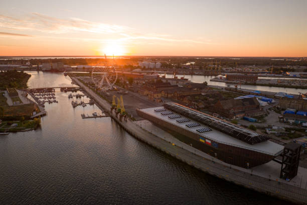 istock Sunset Aerial View of Harbor with Ferris Wheel 2195716655