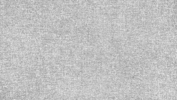 istock close-up view of a gray fabric with a textured weave, offering a subtle, yet elegant background option for design projects. grey upholstery fabric use as background. 2195717425