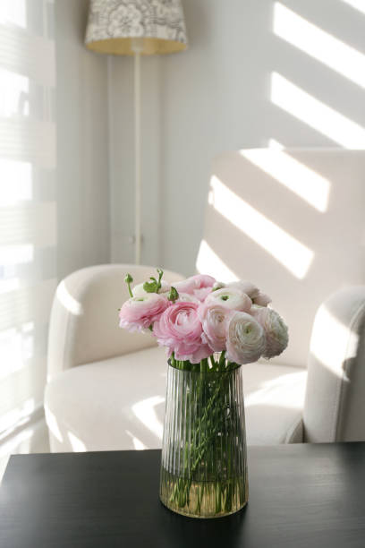istock White and pink flowers in the interior. 2195717715