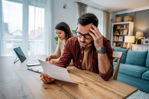 istock Young couple frustrated about financial problems 2195719931