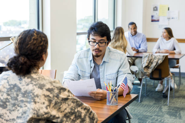 istock Veteran Receives Educational Counseling from Advisor 2195720141