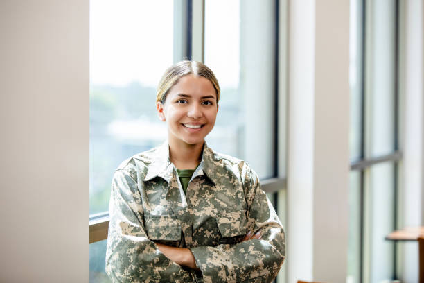 istock Confident Female Soldier in Uniform, Smiling 2195720275