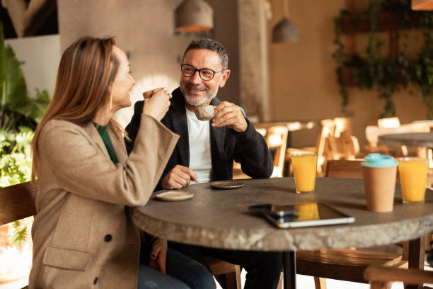 istock Couple enjoying at their favorite cafeteria 2195720641