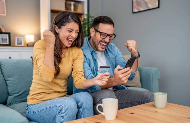 istock Excited couple shopping online 2195720680