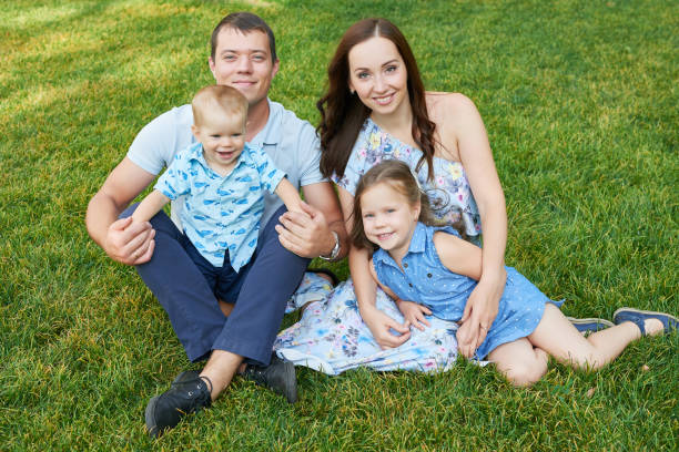 toddler screams and cries in front of family on picnic in garden
