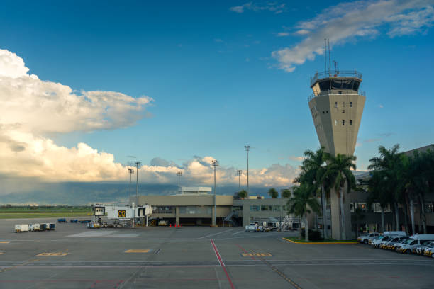 Air traffic tower at Palmira airport serving the city of Cali. Airport control tower at Alfonso Bonilla Aragón International Airport with mountains in the background. Valle del Cauca. Colombia. November 24, 2024. palmira colombia stock pictures, royalty-free photos & images