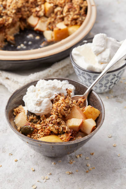 istock Apple and Date Crumble with cream 2195729347