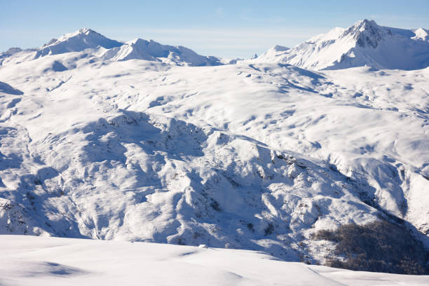 istock Pristine Winter Landscape of Rolling Snowfields. Les Menuires. French Alps. 2195729864