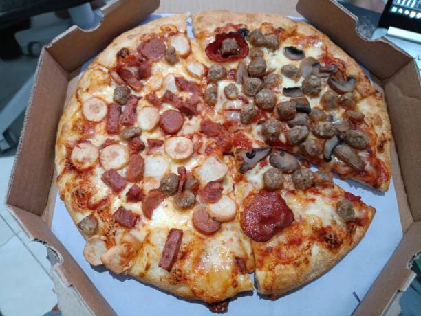 istock Meat lover pizza with paprika and cheese 2195735093