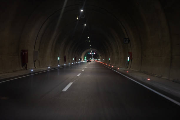 Photo of highway tunnel. Traffic image.