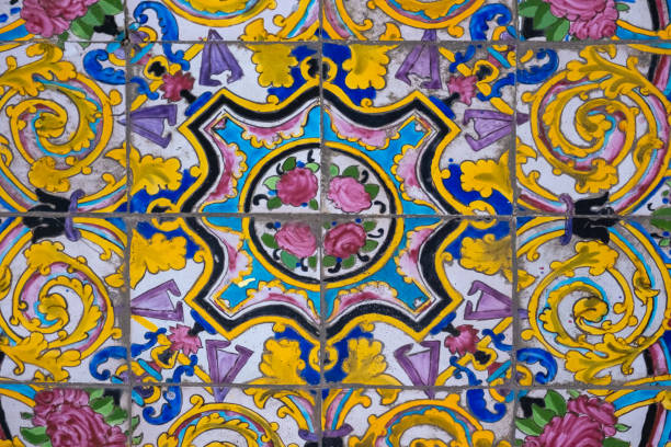 Colorful majolica tiles form a captivating floral pattern, showcasing the rich artistic heritage of tehran, iran, with vibrant hues and intricate designs