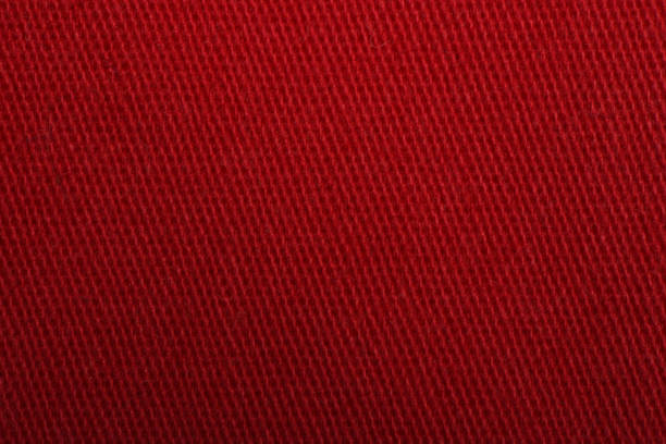 istock Red denim jeans texture close up. Red denim jeans background. 2195744307