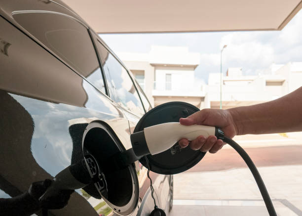 istock Charging an Electric Vehicle at Home 2195748689