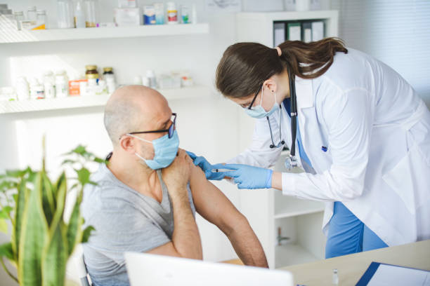 istock doctor and patient in a medical office 2195748792