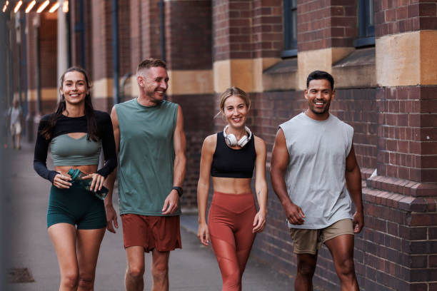 istock Fitness group walking down rthe street 2195755380