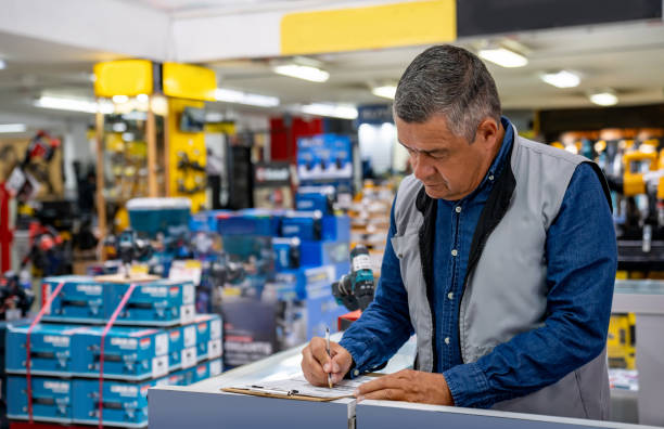 istock Retail clerk working at a hardware store 2195758786