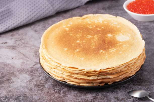 istock Freshly baked pancakes with red caviar 2195761579