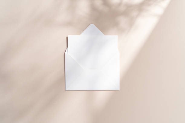 Blank horizontal paper mockup in 5x7 envelope with gobo lighting