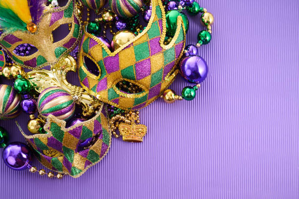 istock Mardi Gras Celebration. Colorful Mardi Gras masks and beads 2195772953