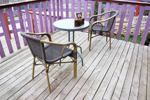 istock A Charming Outdoor Space featuring Cozy Seating with a Table for Relaxation and Gathering 2195773633