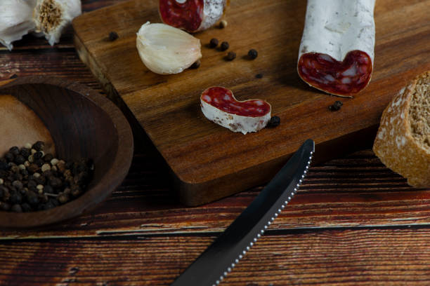 istock Marble cutting board with sliced salami on it 2195773857