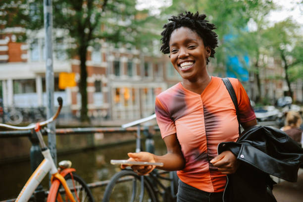 istock Smiling young woman in Amsterdam 2195774871