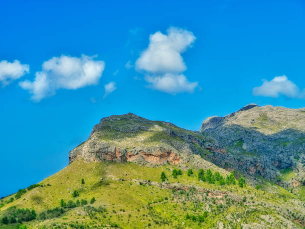 Serra de Tramuntana, Mallorca, Spain.  In 2011, UNESCO World Heritage Site status was awarded to Mallorcaâs magnificent Serra de Tramuntana. This impressive mountain range â almost 90km long â forms the backbone of Mallorca, and stretches from Andratx in the southwest to the Cap de Formentor in the far north of the island.
