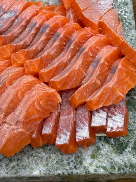 istock Sashimi, a Japanese delicacy featuring thinly sliced raw fish, served fresh and beautifully arranged for a pure and flavorful experience. 2195777587